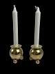 Pair of Swedish ball-shaped brass rods on ball-shaped feet