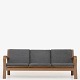 Hans J. Wegner / Getama
GE 671/3 - 3 seater sofa in bent oak and cushions in green wool. Designed in 
1967.
1 pc. in stock
Good, used condition
