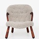 Arnold Madsen / Madsen & Schubell
Early, original Clam Chair in new lambskin (Moonlight) with stained beech 
frame.
Read our blog post about the Clam Chair here: 
https://en.klassik.dk/blogs/news/the-story-behind-the-renowned-clam-chair
Contact us regarding stock
Renovated
