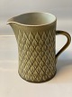 Bing and Grondahl Porcelain Nissen Kronjyden Milk jug
Leaf-shaped pattern
Height 13.4 cm 
SOLD