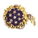 Italienische Brosche aus 18kt Gold mit ca. 7,75ct Diamanten und 27,7ct Saphiren. 
Rom um 1950-60. Masse: 83x59mm. G: 78gr