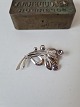 Vintage brooch in silver with purple stone
