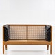 Bernt Petersen / Wørts Møbelsnedkeri
2-seater sofa in patinated oak and cane with black leather cushions.
1 pc. in stock
Good, used condition
