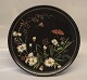 108 Black Teracotta platter 27 cm  decorated with flowers and butterflies ca 
1890 Ipsen Danish Art Pottery