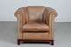 Chesterfield Chair
Light color leather
+ legs of mahogany
