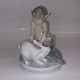 Royal Copenhagen:.Pan / faun med kanin figur I porcelæn