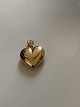 Beautiful and elegant gold heart in 14 carat gold. Stamped 585 SEJ Pendant for 
necklace or bracelet.