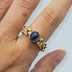 A ring in 18k gold set with sapphire and diamonds