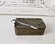 Cigarette holder in hammered silver with green stone by Bernhard Hertz