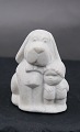 Stone Art slightly sandy colored figurine from Marbell, Belgium. 2 Friends or 
Dog look after baby.