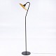 Poul Henningsen / Louis Poulsen
Floor lamp model PH 3/2 (number 7) with upper shade in gold-lacquered metal and 
lower shades in frosted glass. Frame in burnished brass and socket housing in 
Bakelite.
1 pc. in stock

