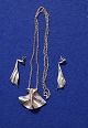 Set of jewelry in sterling silver 925. Necklace with jewelry and a pair of 
pendants with earrings by Danish silversmith Bent Larsen.