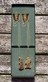 Georg Jensen Denmark Christmas decorations. Pair of candle holders in gilded 
brass, Star and Girl