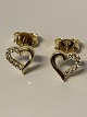 18 carat Gold heart earrings with clear stones.