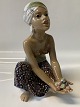 Dahl Jensen figurine Oriental Fruit Seller 1238. H: 21.5 cm.