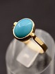 14 carat gold ring with cabochon cut turquoise