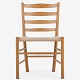 Kaare Klint / Fritz Hansen
Kirkestolen i massiv egetræ og flettet papirgarn med tilhørende hynde i 
Alcantara. Model KK 4133. Formgivet i 1936 til Grundtvigs Kirke og 
Bethlehemskirken i København.
Proveniens: Gl. Holte Kirke.
10 stk. på lager
