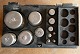 Weights in clear steel and in a box, all stamped. A total of 12 weights from 500 
gram down to 1 gram.