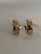 14 carat earrings with a zircon in red / white gold