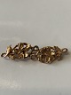 14 Karat gold brooch with flowers