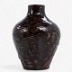 Axel Salto / Royal Copenhagen.
En vase i delvist glaseret chamotte. Signeret.
1 stk. på lager
