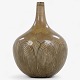 Axel Salto / Royal Copenhagen.
Vase i stentøj med indridset bladdekoration og Solfatara-glasur (model 20736). 
Signeret.
1 stk. på lager
