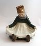 Royal Copenhagen. Porcelænsfigur. Fanø pige. Model 1315. Højde 13 cm. (4 
sortering)