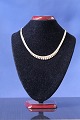 Necklace in 14 carat gold, brick in 5 rows, with a gradient, stamped 585 JøS. 
Length 40 cm.