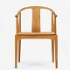 Hans J. Wegner / Fritz Hansen.
FH 4283 - Chinese chair in cherry with cushion in patinated natural leather. 
Manufacturer