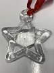 Glass hanging poinsettia, Bertil Vallien, Kosta Boda.Size 8 x 6.5 cm.