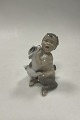 Royal Copenhagen Figur af Faun med hund No 2823