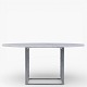 Poul Kjærholm / E. Kold Christensen.PK 54 - Round dining table with light flint-rolled marble top on a frame of matt chrome-plated steel. Designed in 1963.1 pc. in stock