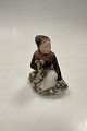 Royal Copenhagen Overglaze figurine of Amager Flower Girl No. 12412
