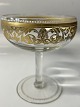 Champagneskål med guldbemaling fra omkring 1920 Højde: cm. 11,0 cm.