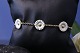 Sølvarmbånd fra Georg Jensen Daisy-serien, med margueritter i sterlingsølv, stemplet 925