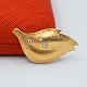 Ole Lynggaard; Broche af 14 kt. guld med diamanter