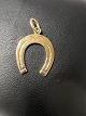 14 karat guld. Hestesko. Charms / Vedhæng.Højde 2,3 cm.