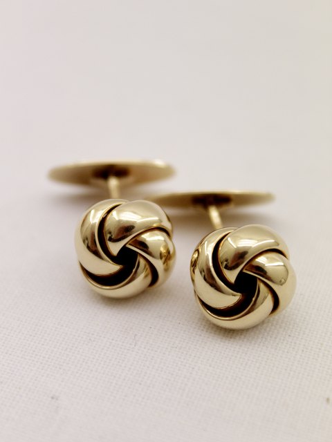 B Hertz 14 carat gold knot cufflinks
sold