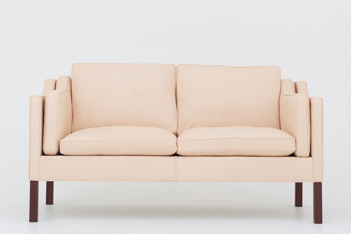 Børge Mogensen / Fredericia Furniture
BM 2212 - Reupholstered 2-seater sofa in natural leather with mahogany legs. We 
can offer upholstery of the sofa in fabric or leather of your choice.
Availability: 6-8 weeks
Renovated
