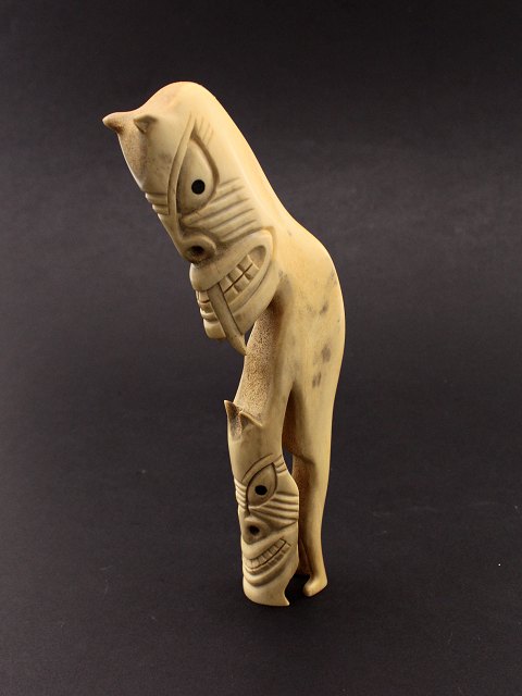 Greenlandic tupilak of carved antler H. 23 cm.