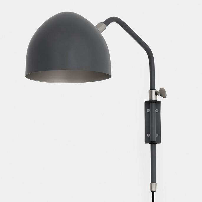 KLASSIK STUDIO / KLASSIK STUDIO
Studio - Wall light in metal (grey/nickel).
The Studio wall light from Klassik Studio combines an elegant design with a 
warm, inviting atmosphere and the adjustable shade lets you adjust the light as 
needed. Available in several colours, you can easily find the variant that suits 
your style.
Let Studio create a cosy atmosphere and become a stylish focal poi