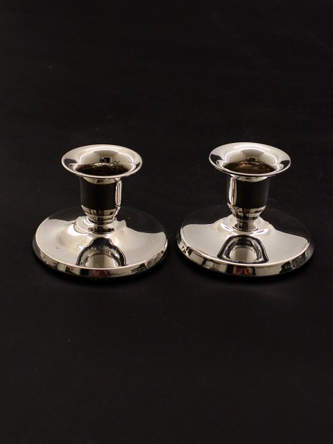 A pair of small 830 silver candlesticks