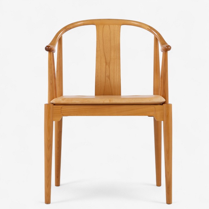 Hans J. Wegner / Fritz Hansen.
FH 4283 - Chinese chair in cherry with cushion in patinated natural leather. 
Manufacturer