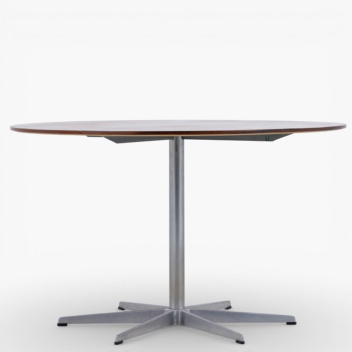 Arne Jacobsen / Fritz Hansen.Dining table with round rosewood top on a six-legged steel frame.1 pc. in stock