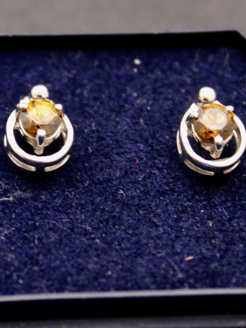 Sterling silver ear stud with yellow topaz